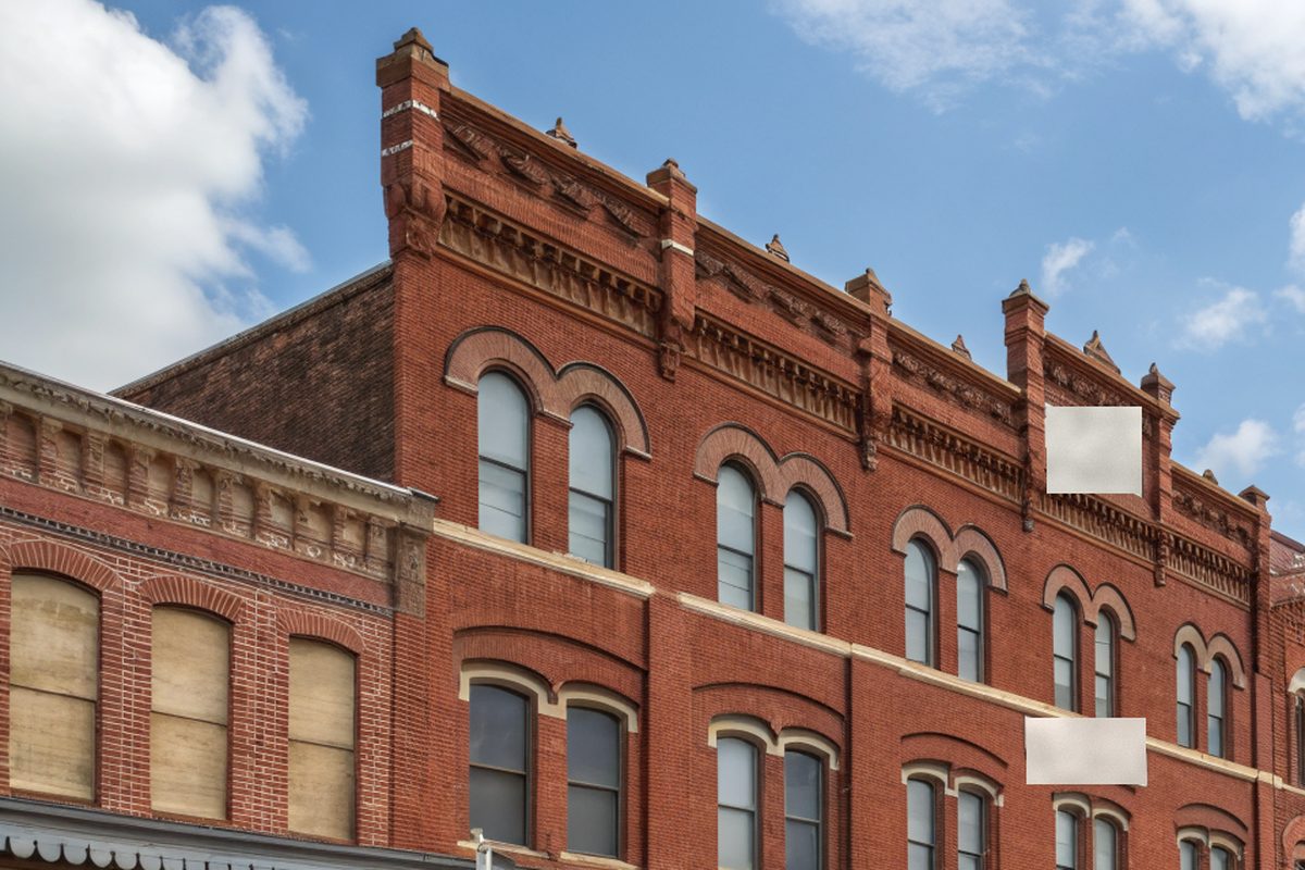 Old red-brick buildings on a small-town main street